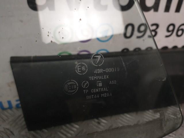 Стекло двери задней левой GS6712D307 XYG