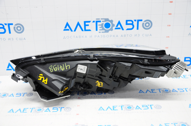 Фара правая Tesla 107737200L