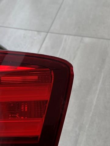 Задний левый внутренний фонарь BMW 63217203227