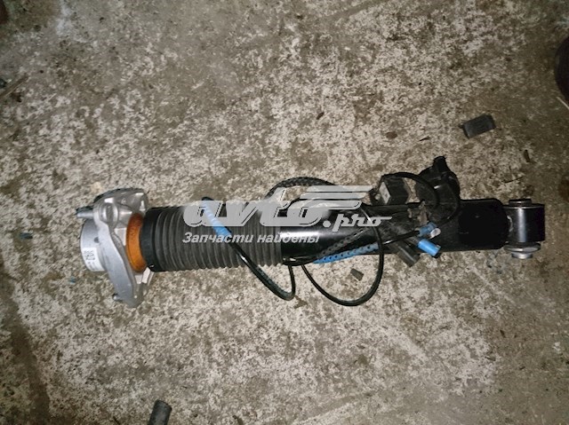 Амортизатор задний левый 37126875087 BMW