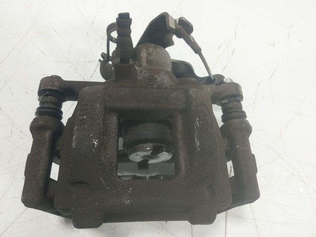 1843320 Ford Суппорт тормозной задний правый