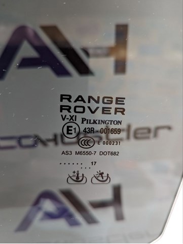 Стекло двери задней левой LR052677 Land Rover