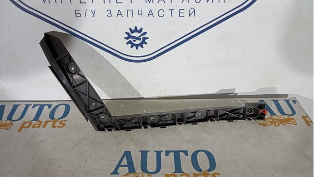 Кронштейн бампера заднего внешний левый 22793773 General Motors