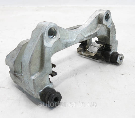 Купить 410015MT0A Nissan/Infiniti Суппорт тормозной передний правый