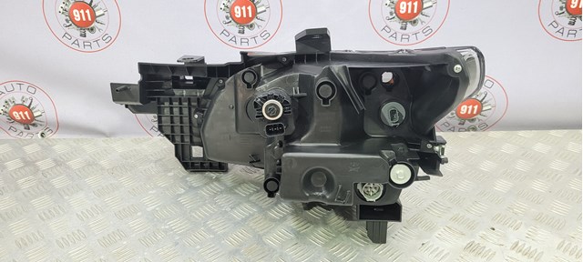 Правая фара TM52510K0 Mazda