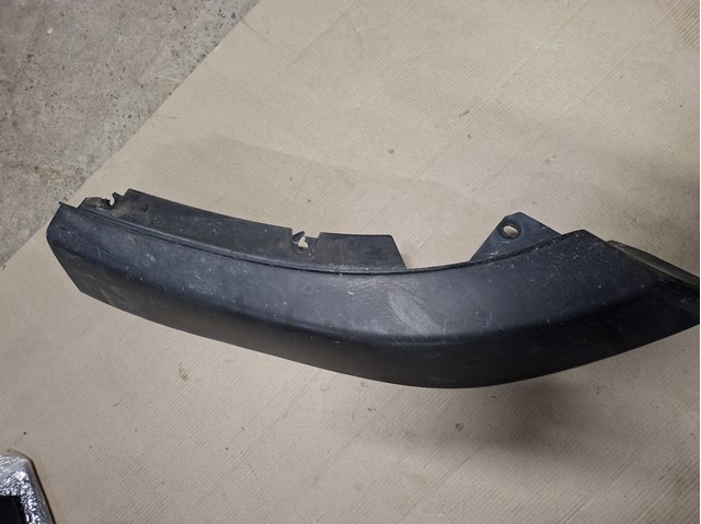 TK4850371 Mazda Накладка бампера заднего, левая