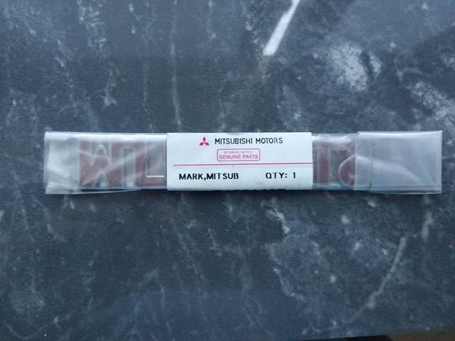  Emblema de tampa de porta-malas (emblema de firma) Mitsubishi Colt V hatchback (CJA) (1996 - 2004) V