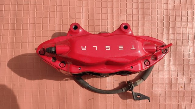 Суппорт тормозной передний правый Tesla 100779501D