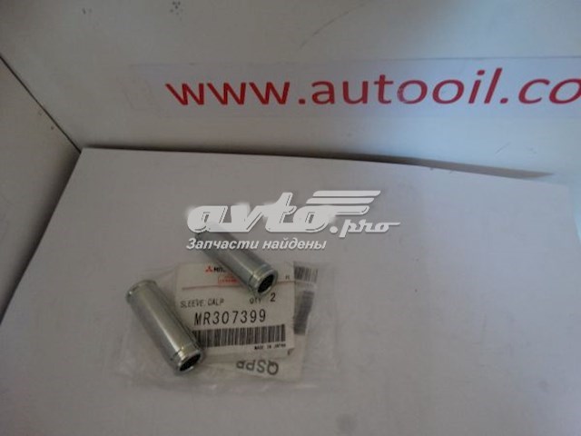 MR307399 Mitsubishi Guia superior de suporte traseiro