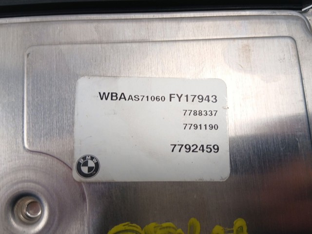 Модуль управления двигателем BMW 7791190